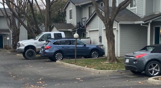 durham-feature street view of gray houses with cars parked in driveway